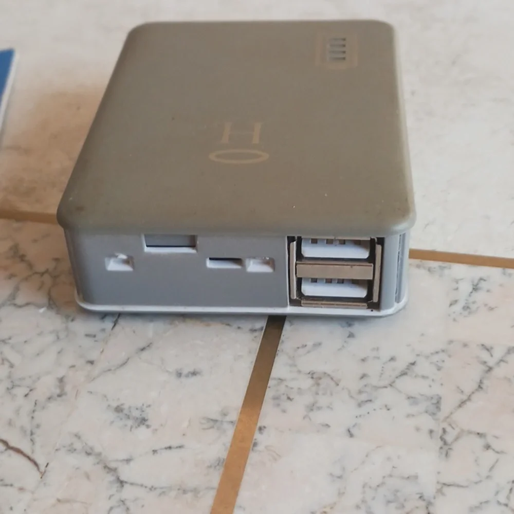 Cell Phone Portable Power bank W/cables,a flashlight & booklet